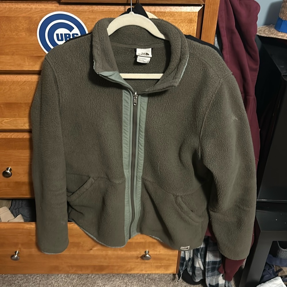 The North Face green Sherpa fleece jacket.